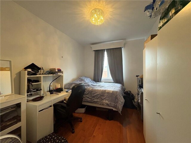 bedroom featuring hardwood / wood-style flooring