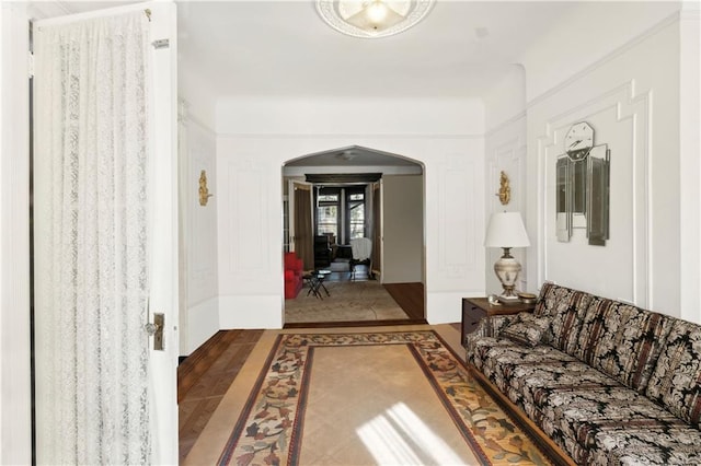 corridor with wood-type flooring