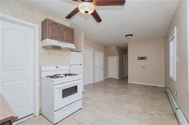 kitchen featuring tasteful backsplash, white gas range oven, dark brown cabinets, a baseboard radiator, and ceiling fan