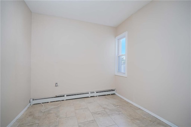 empty room featuring a baseboard radiator