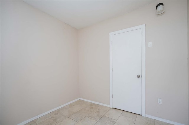 view of tiled spare room