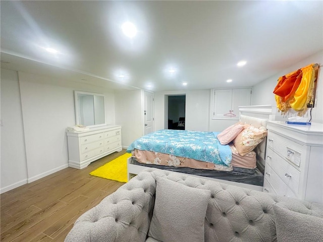 bedroom with light hardwood / wood-style floors