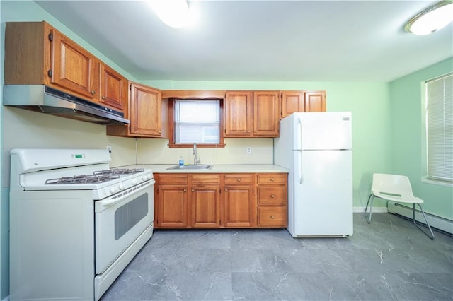 kitchen featuring a baseboard heating unit, sink, and white appliances