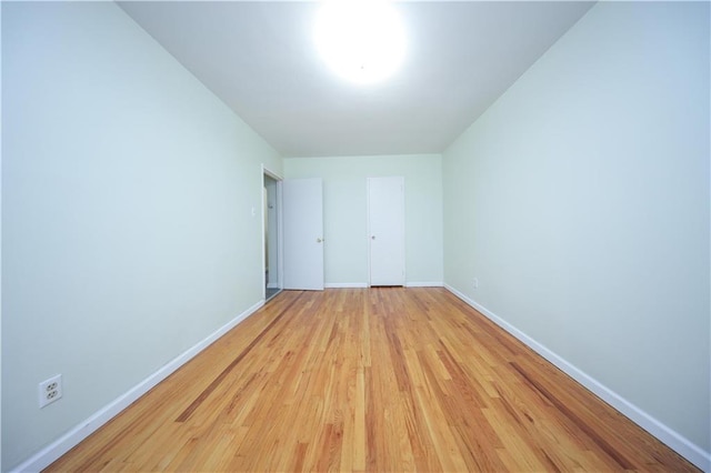 unfurnished bedroom with light hardwood / wood-style floors