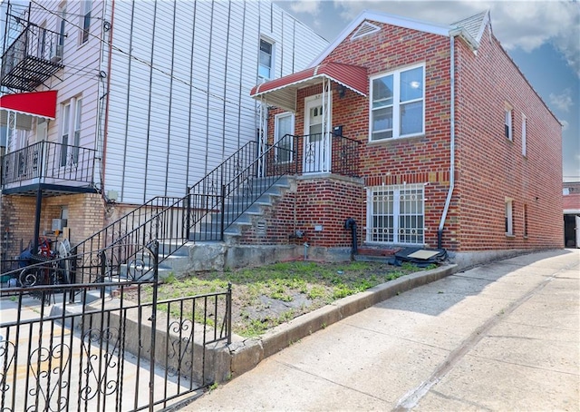 view of front facade featuring brick siding