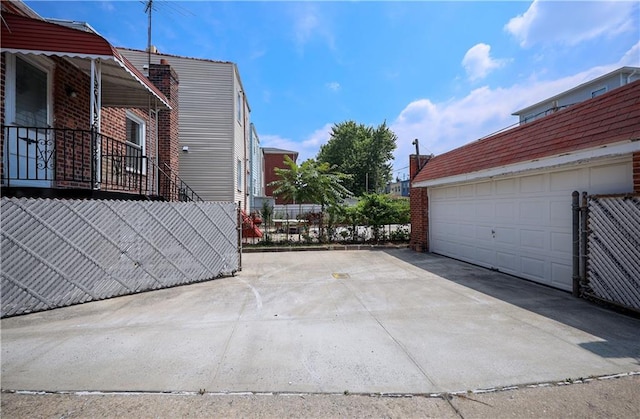 view of side of property with a garage