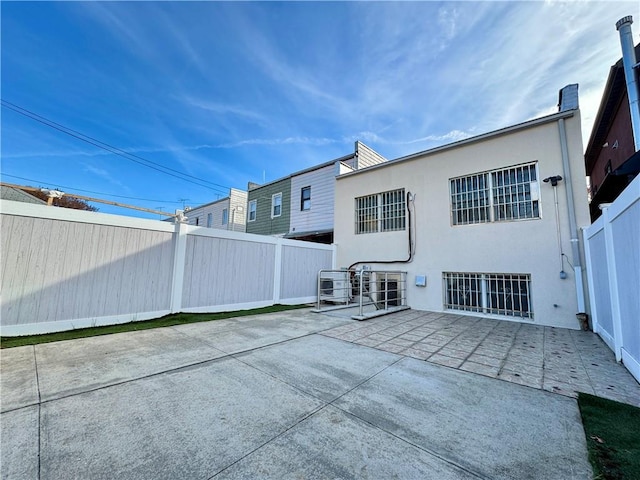 rear view of property with a patio