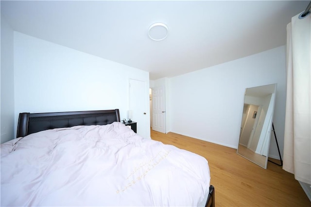 bedroom featuring light wood-type flooring