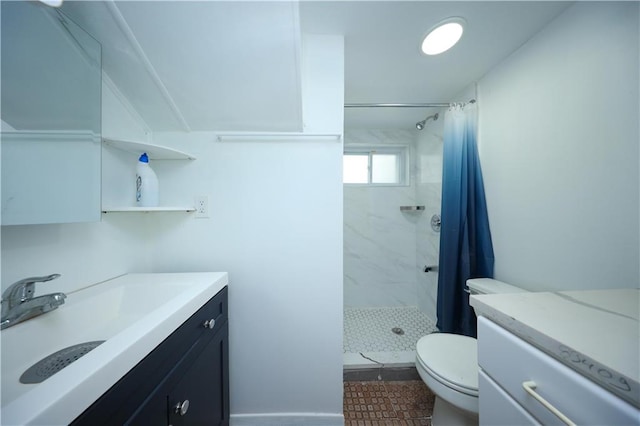 bathroom with tile patterned flooring, vanity, toilet, and walk in shower