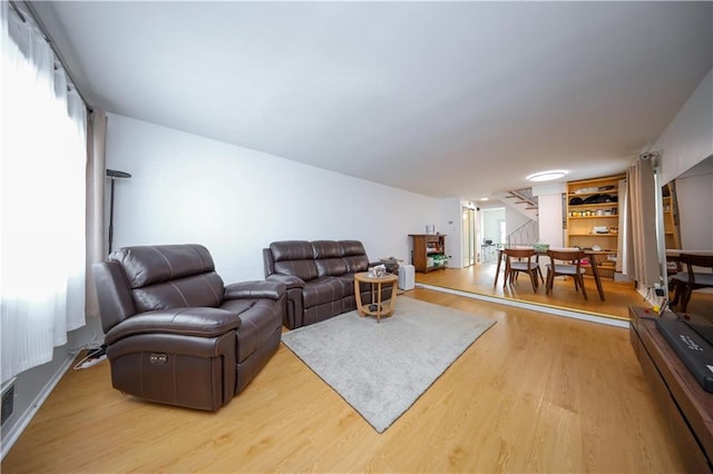 living room featuring light hardwood / wood-style floors