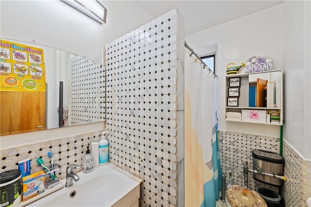 bathroom with sink and walk in shower