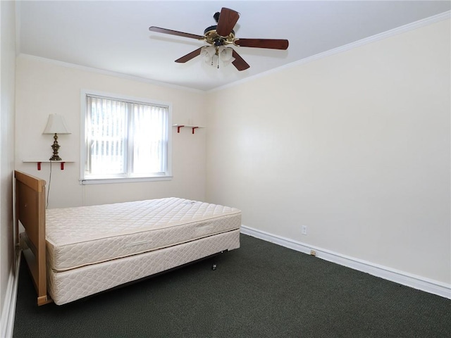 carpeted bedroom with ceiling fan and ornamental molding