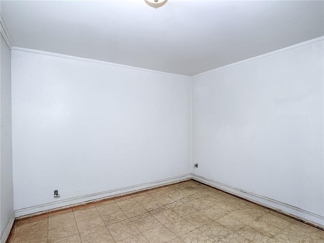 unfurnished room featuring ornamental molding