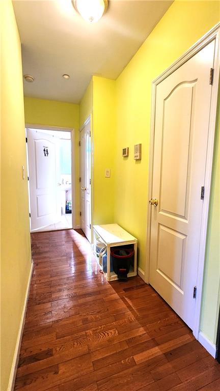 hall featuring dark hardwood / wood-style floors