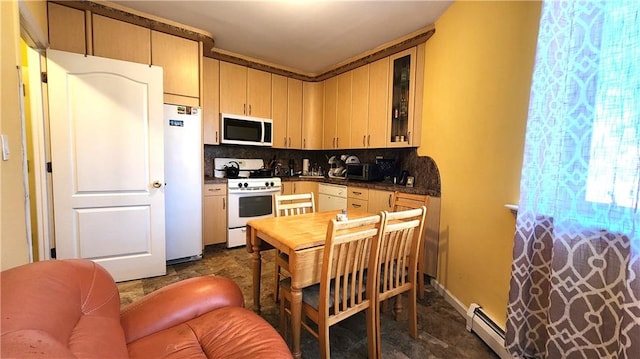 kitchen with white appliances, backsplash, and light brown cabinetry