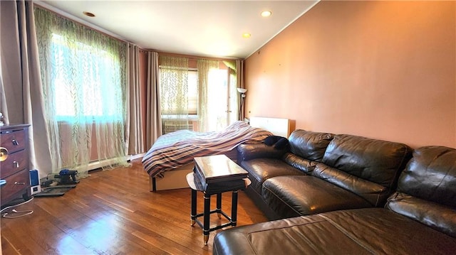 bedroom with wood-type flooring