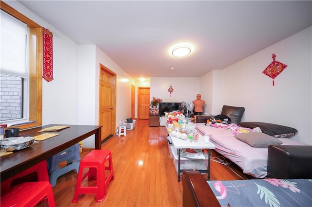 bedroom featuring wood-type flooring