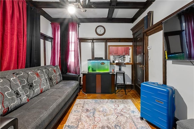 living room with coffered ceiling and beam ceiling