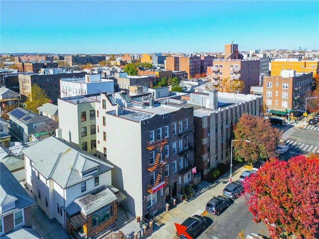 drone / aerial view featuring a city view