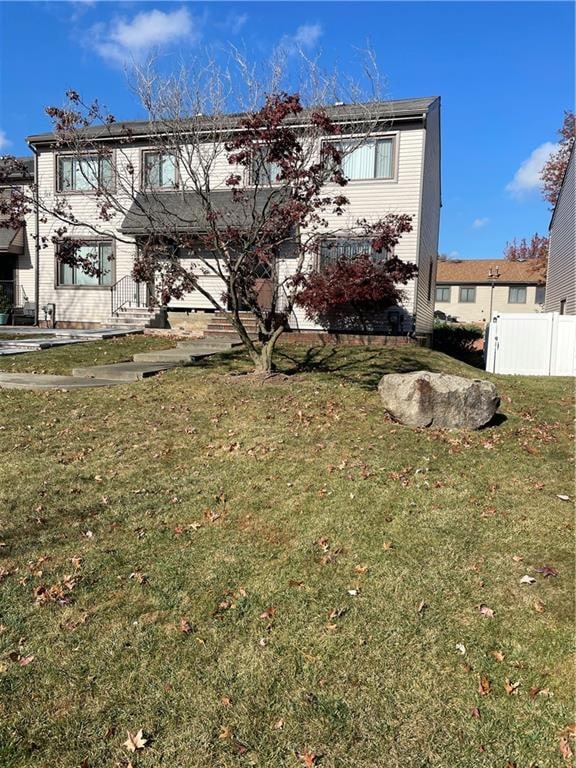 exterior space with a front yard