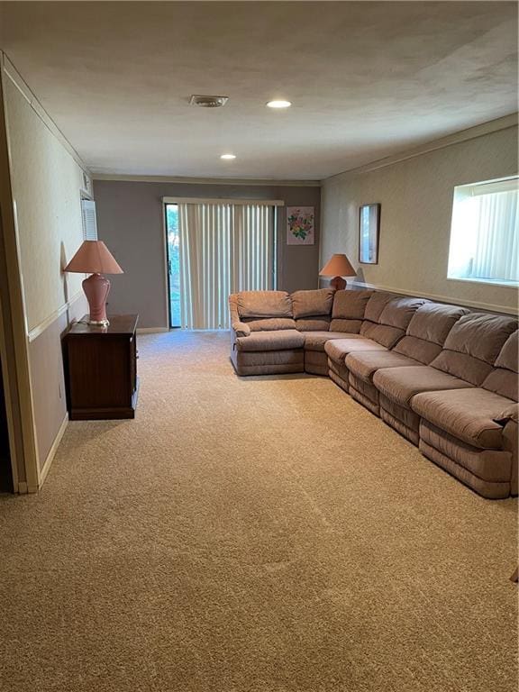 unfurnished living room featuring carpet and ornamental molding