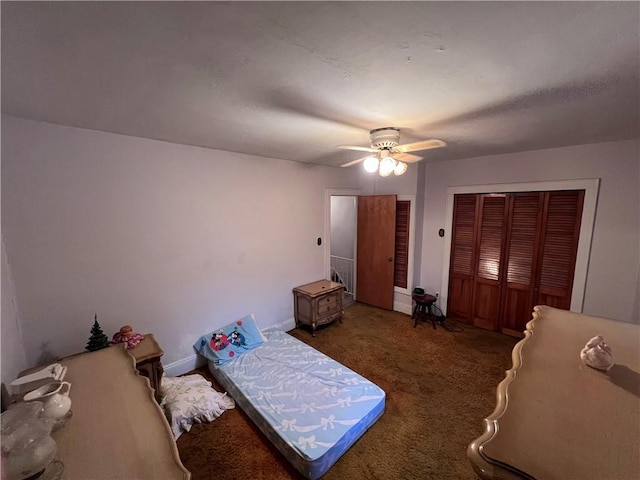 bedroom featuring carpet, baseboards, and ceiling fan