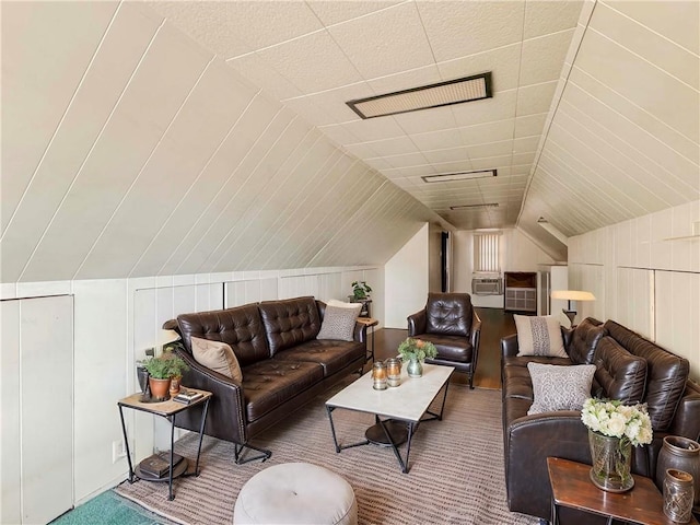 interior space with vaulted ceiling and carpet flooring