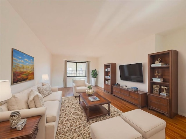 living room with wood finished floors