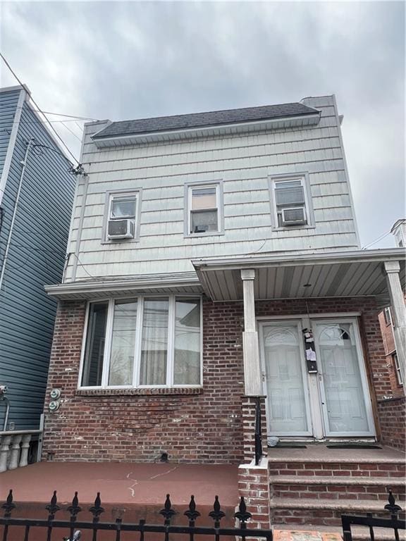 1044 E 96th St, Brooklyn, NY 11236 - view of front of home with brick siding and cooling unit