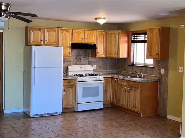1044 E 96th St, Brooklyn, NY 11236 - kitchen with white appliances, under cabinet range hood, a sink, a ceiling fan, and tasteful backsplash