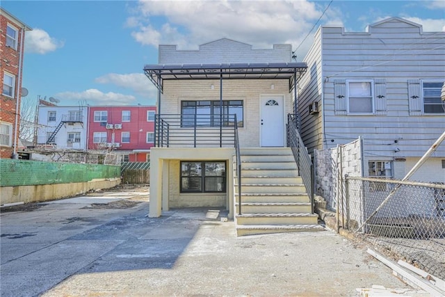 view of front of home with fence