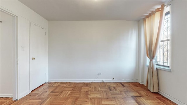 unfurnished bedroom featuring baseboards