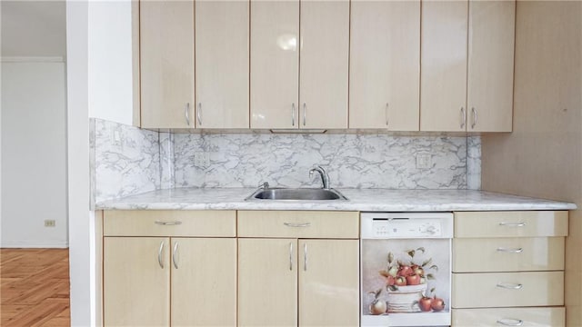 1877 E 12th St Unit 1G, Brooklyn, NY 11229 - kitchen featuring white dishwasher, a sink, light brown cabinetry, and tasteful backsplash