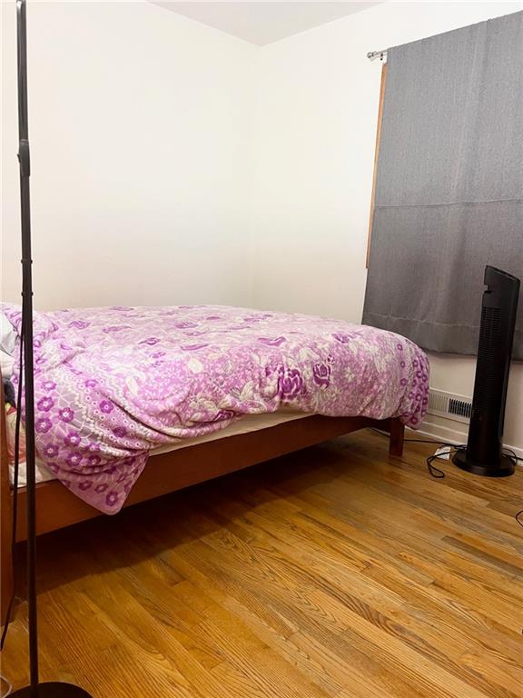 bedroom featuring light wood-type flooring