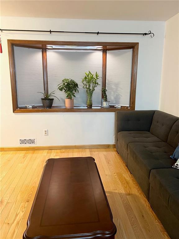 living room with hardwood / wood-style flooring