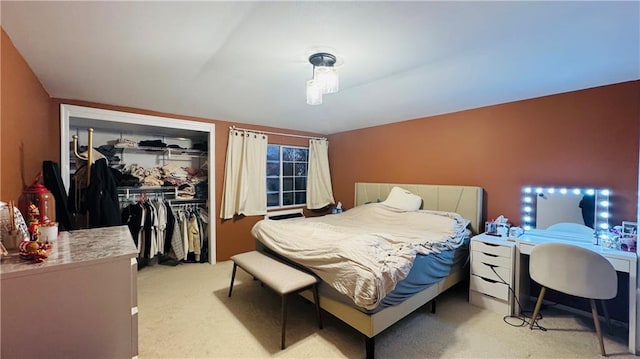 carpeted bedroom featuring a closet