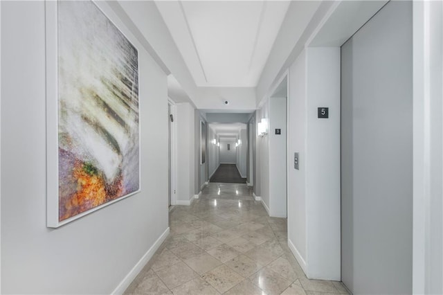 40 Oceana Dr W Unit 5G, Brooklyn, NY 11235 - hallway with baseboards and elevator