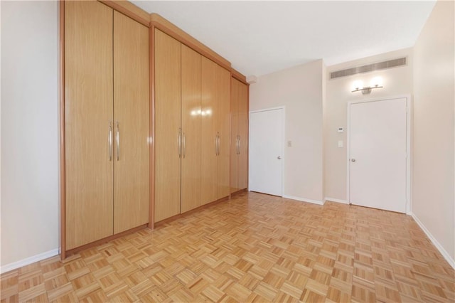 40 Oceana Dr W Unit 5G, Brooklyn, NY 11235 - unfurnished bedroom with baseboards