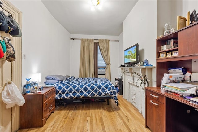 bedroom featuring light hardwood / wood-style flooring