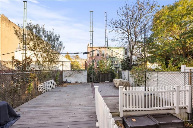 wooden terrace featuring area for grilling