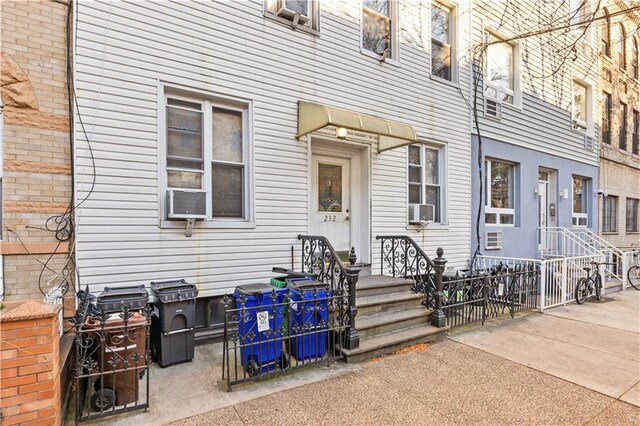 property entrance with cooling unit