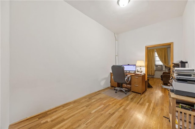 home office featuring light hardwood / wood-style flooring