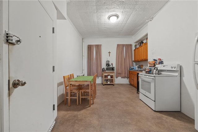 kitchen with white electric range and light carpet