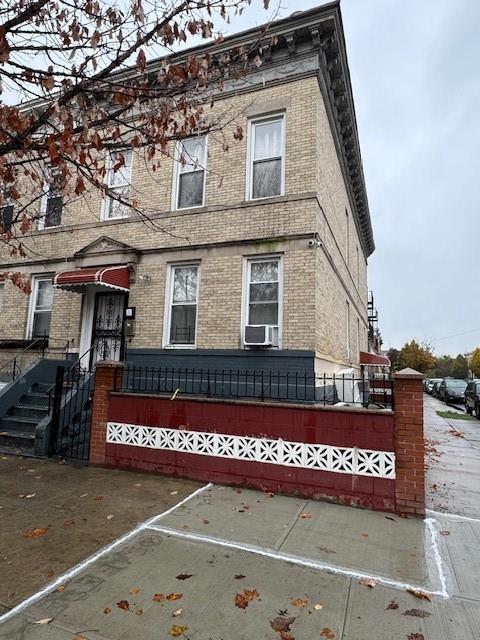 view of front of home featuring cooling unit