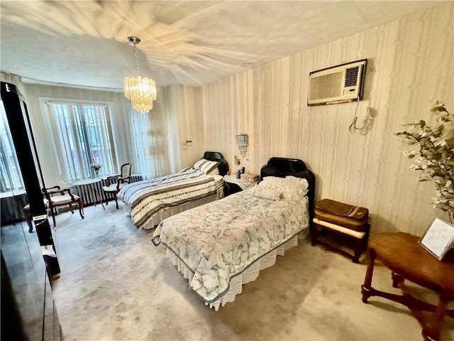 carpeted bedroom with a notable chandelier and an AC wall unit