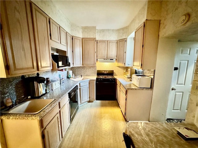 kitchen with light hardwood / wood-style floors, sink, light brown cabinetry, and black appliances