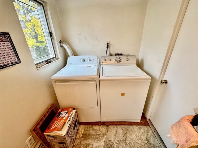 laundry area with washer and dryer