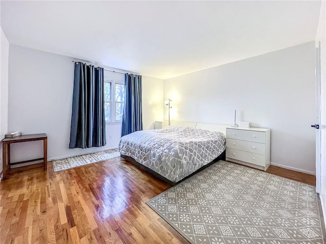 bedroom featuring hardwood / wood-style floors