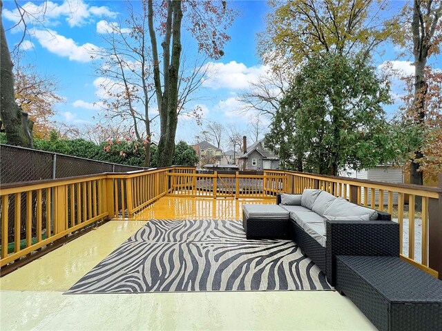 wooden deck with outdoor lounge area