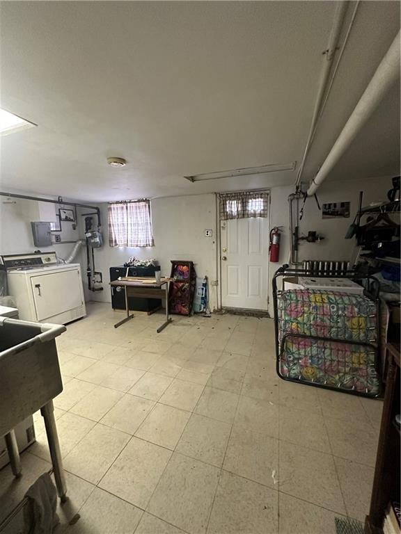 interior space with washer / clothes dryer and sink